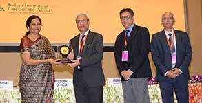 Hon’ble Minister of Finance and Corporate Affairs, Smt. Nirmala Sitharaman, presenting the National CSR Award to our C&MD, Shri M. K. Surana